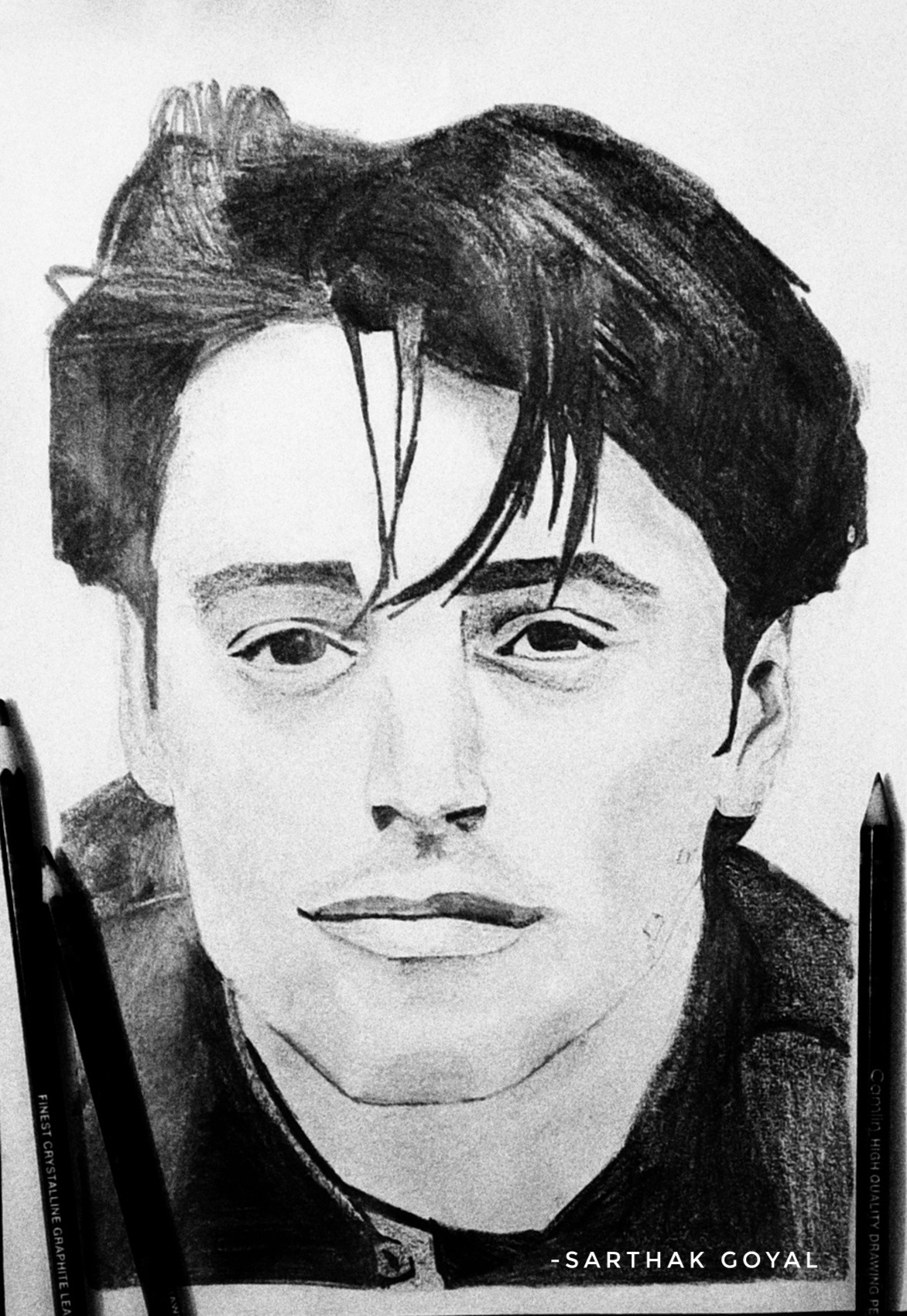 A pencil portrait sketch of a man, signed by Sarthak.