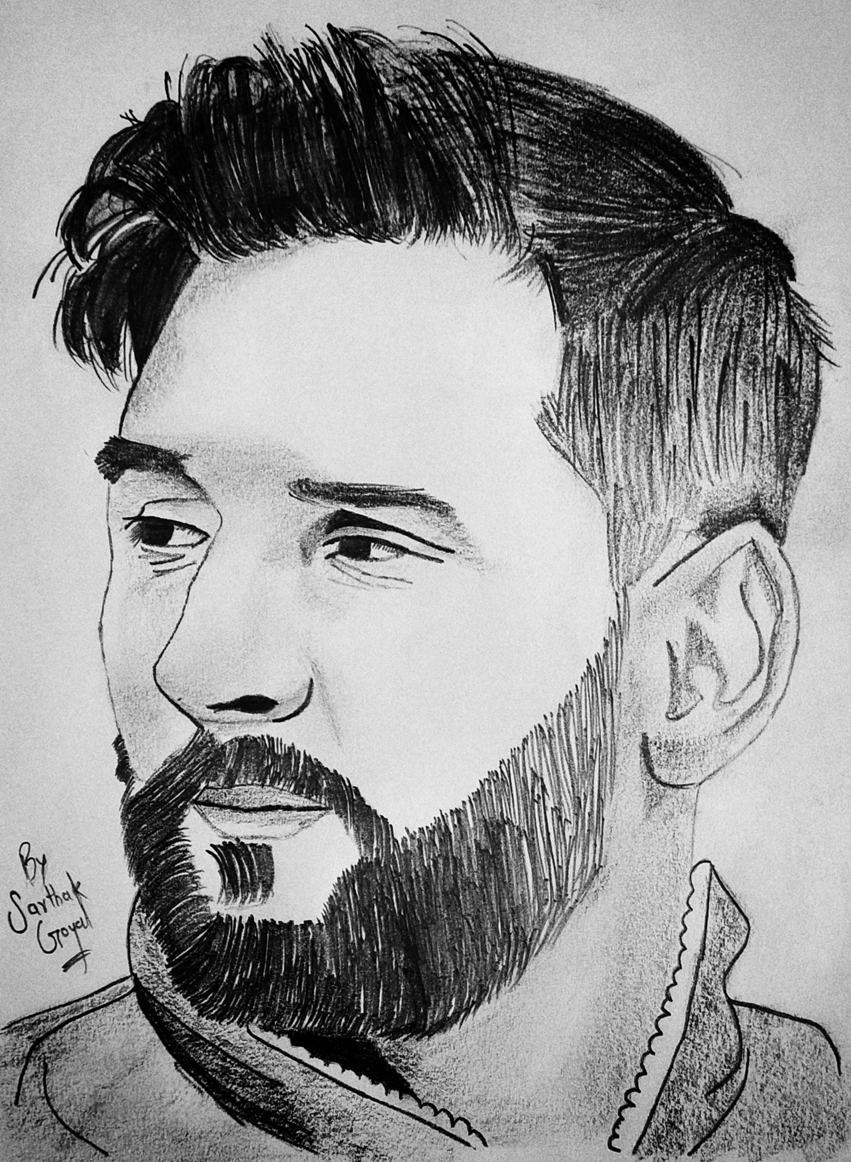 A pencil portrait sketch of a bearded man, signed by Sarthak.